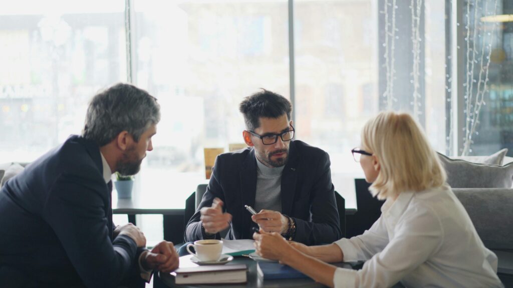 A group of people in a meeting.