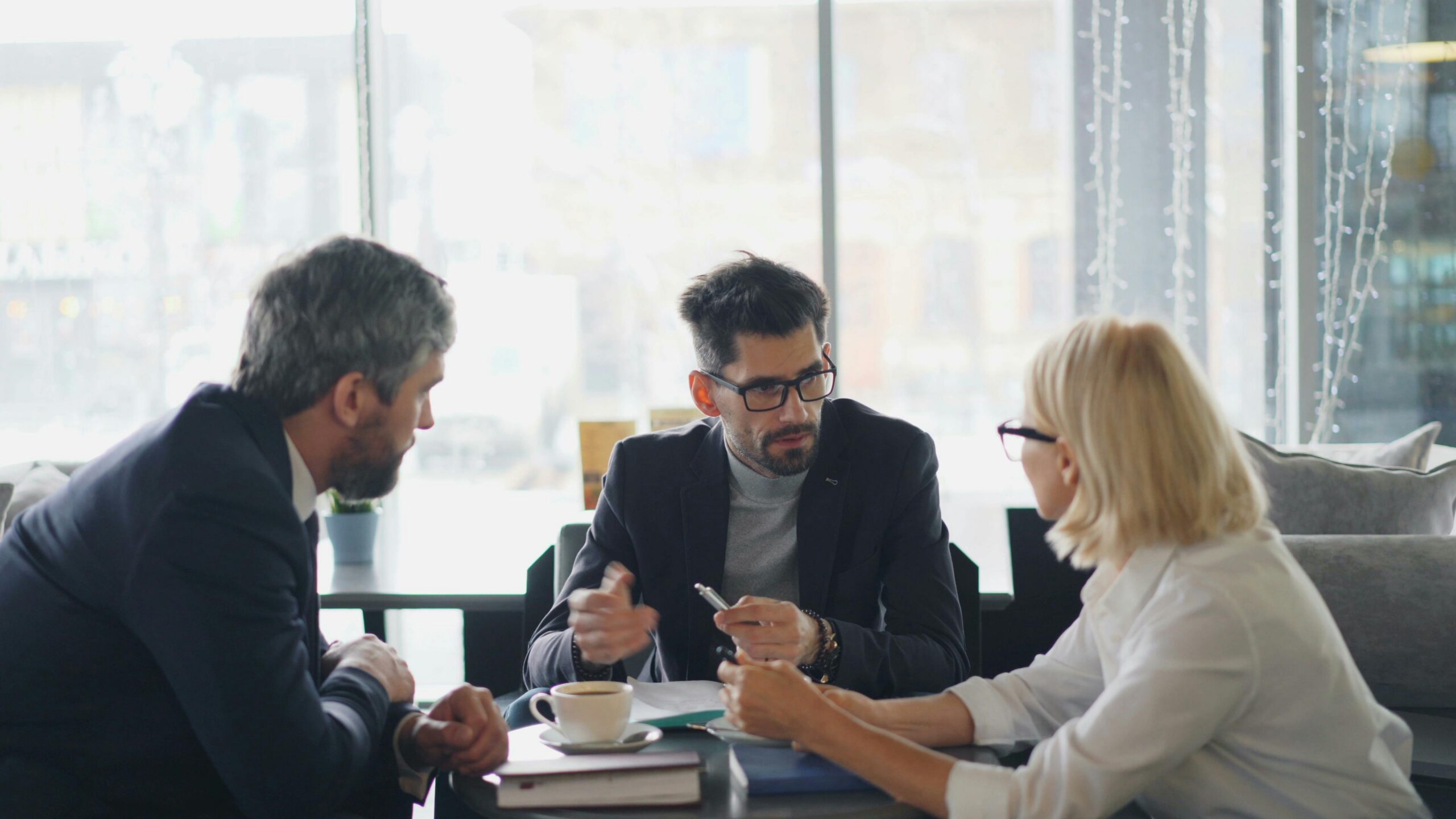 A group of people in a meeting.